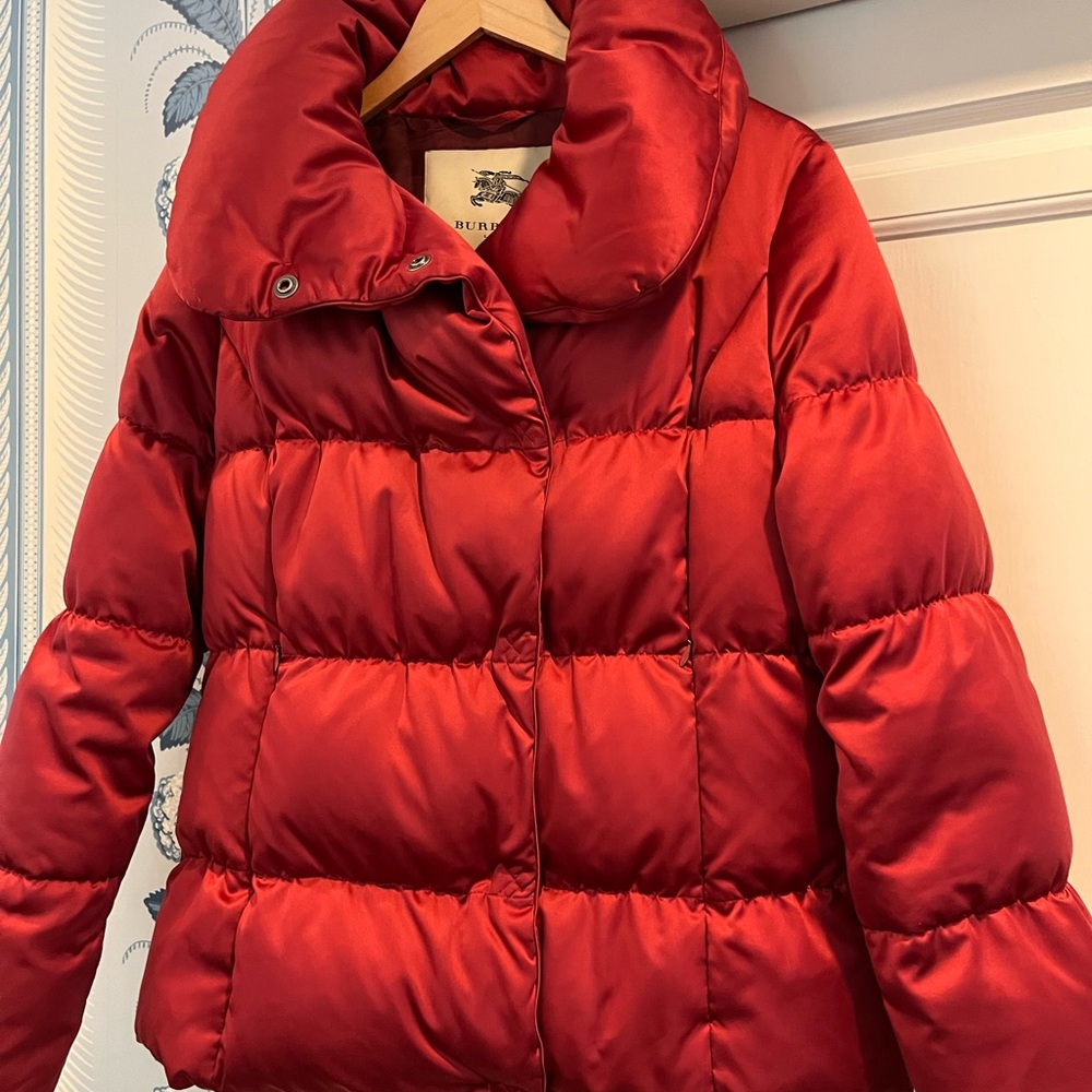 Authentic Burberry deep red, wine colored puffer jacket. Hits near hip.